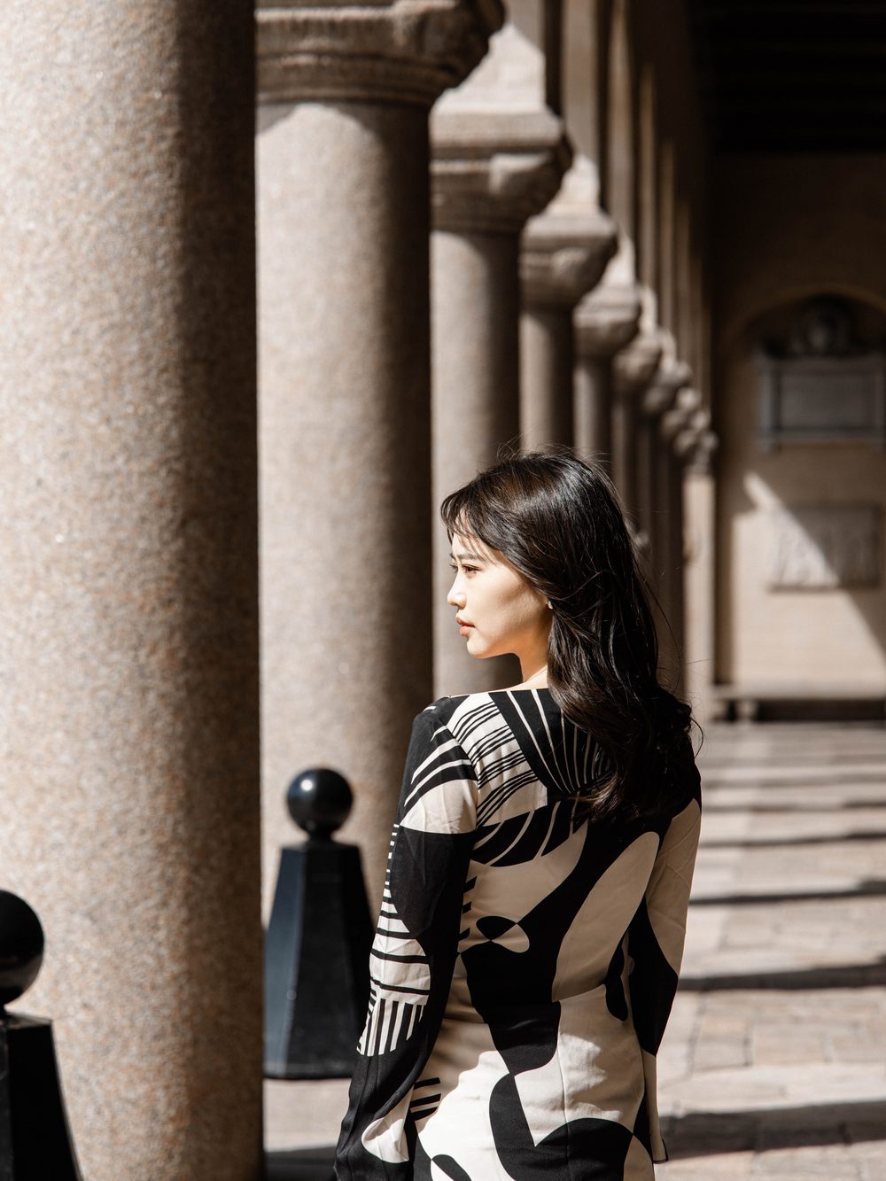 Portrait between stone columns